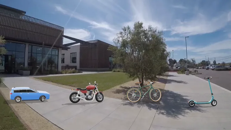 An exported frame: the four built-in 3D vehicles side by side on the pavement — a blue car, a red motorbike, a green bicycle and a turquoise e-scooter.